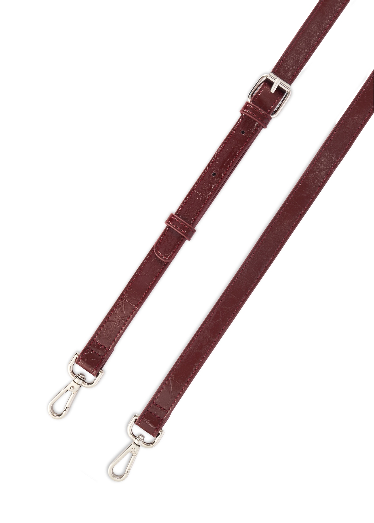 Dámska kabelka v bordovej farbe TOREC-0728A-49(Z25), detailný záber na odnímateľný popruh produktu, pohľad na bielom pozadí.