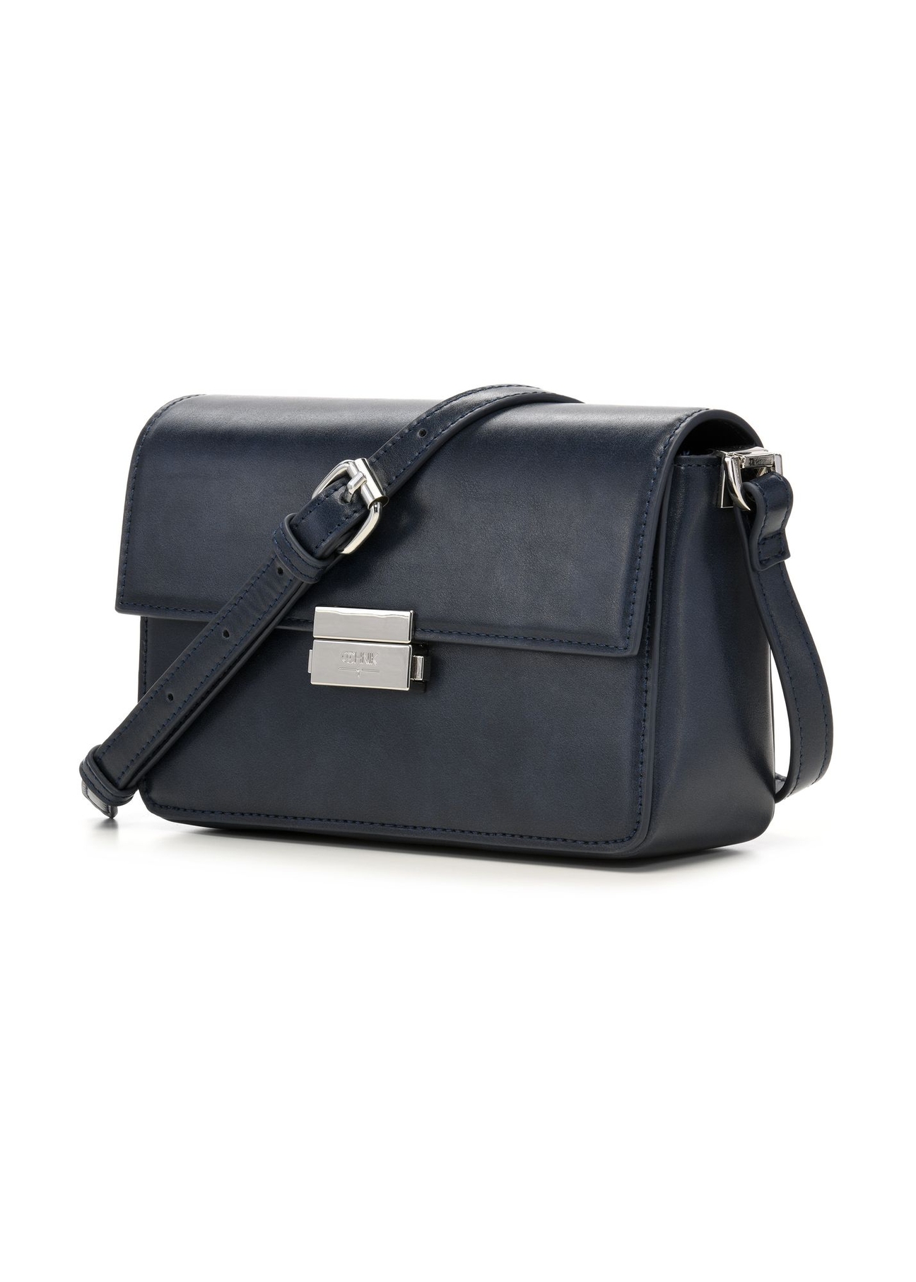 Elegantná dámska kabelka v tmavomodrej farbe TOREC-1251-7E(Z26) - diagonálny pohľad na produkt, na bielom podklade.