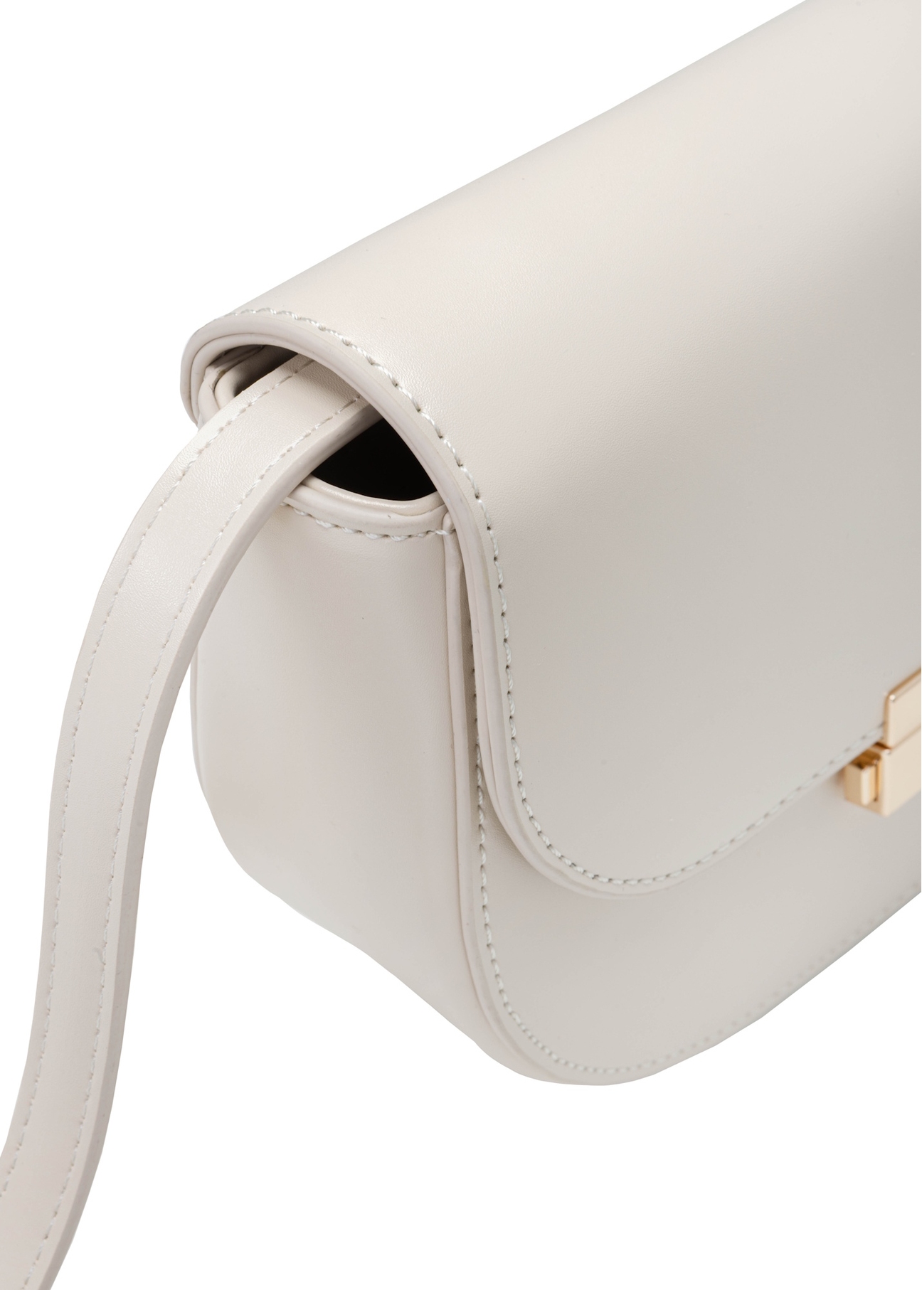 Dámska krémová polkruhová taška cez rameno TOREC-1127-0B(W26), detail produktu na bielom pozadí.