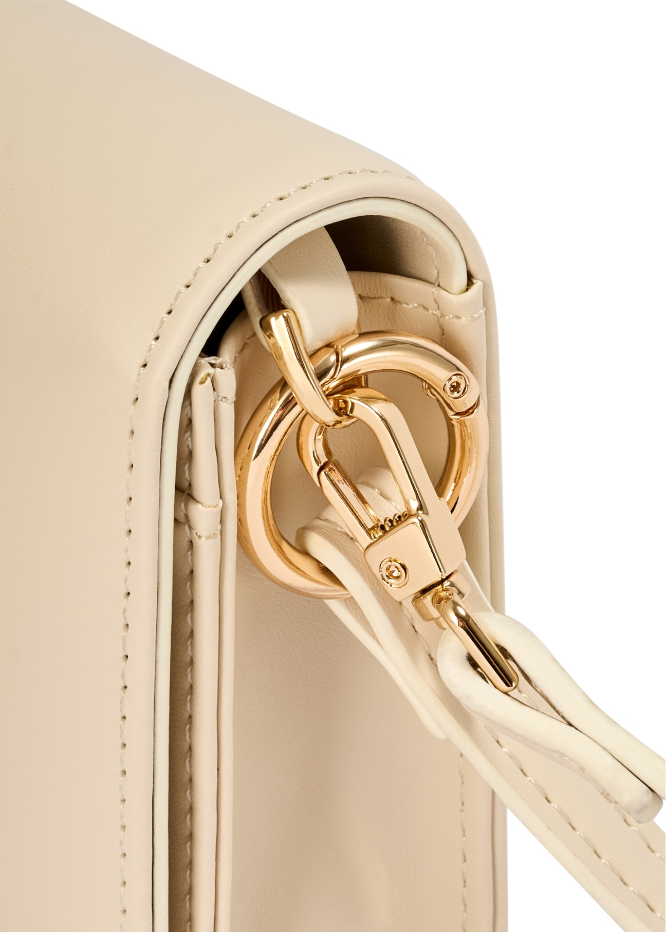 Dámska peňaženka krémovej farby s remienkom POREC-0431-0B(W26) - detailný záber, na bielom pozadí.