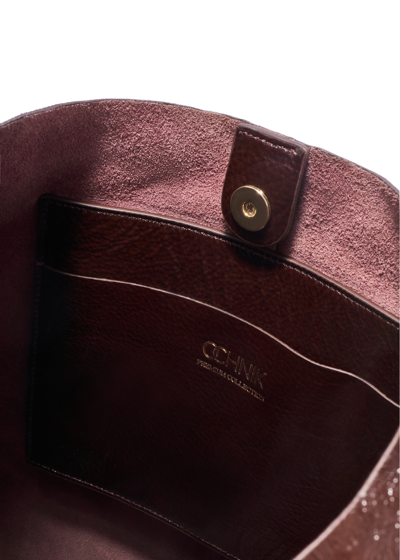 Veľká hnedá kožená dámska kabelka TORES-1179-1I(W26), pohľad na produkt vo vnútri na bielom pozadí.