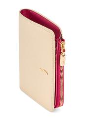 Dámska kožená peňaženka v krémovej farbe PORES-0983-0P(W26), detail produktu na bielom pozadí.