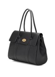 Čierna veľká dámska kabelka TOREC-1139-9I(W26), diagonálny pohľad na produkt na bielom pozadí.