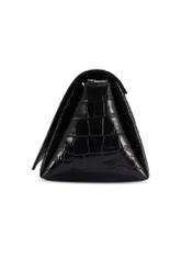 Čierna kožená dámska kabelka TORES-1234-9G(W26), pohľad na produkt zboku na bielom podklade.