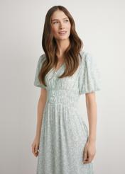 Dlhé kvetinové šaty SUKDT-0191-8P(W26), pohľad spredu na modelku. Viditeľná polovica siluety.