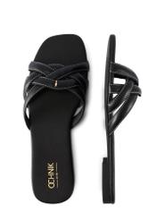 Dámske čierne kožené šľapky s pleteným vzorom BUTYD-1222-99(W26), pohľad na produkt zhora na bielom pozadí.