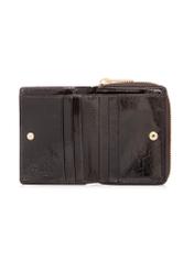 Malá hnedá kožená dámska peňaženka PORES-0988-1I(W26), pohľad na produkt vo vnútri na bielom pozadí.