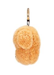 Hnedá kľúčenka v tvare psa BRELOK-210A-81(Z25), bočný pohľad na produkt na bielom pozadí.