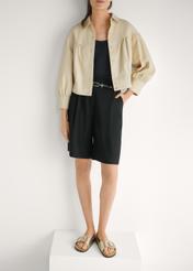 Dámske zlaté kožené šľapky BUTYD-1157-2X(W26), pohľad spredu na produkt na nohách modelky.