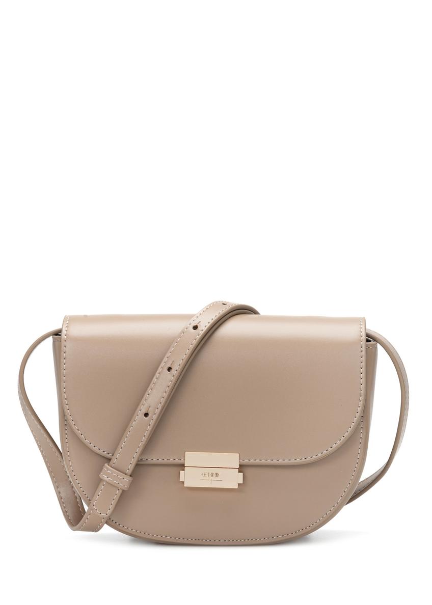 Dámska polkruhová taška cez rameno TOREC-1127-1D(W26), pohľad spredu na bielom pozadí.